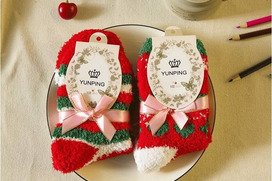 Kalėdinės kojinės, paruoštos dovanai
