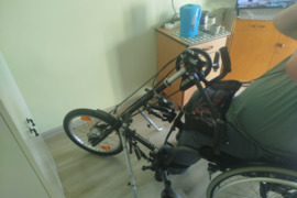 Mechaninis neigaliojo vežimėlio varytuvas
