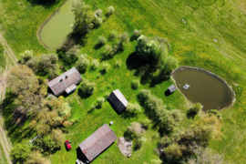 Šalia Alytaus 14,3ha žemės su pastatais- tinka komercijai