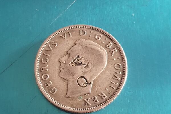 Reta Šiaurės Airijos konflikto sidabrine moneta